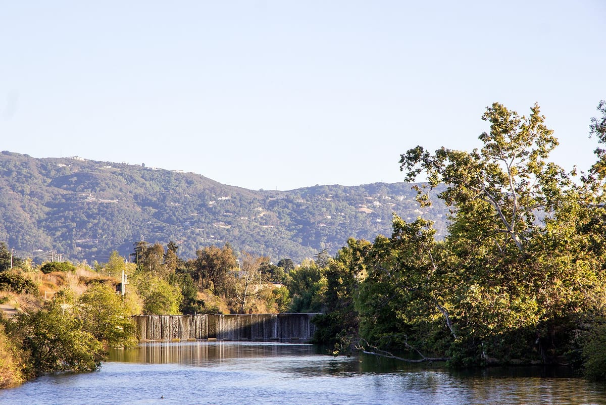 Los Gatos Creek below the hills, with a small dam