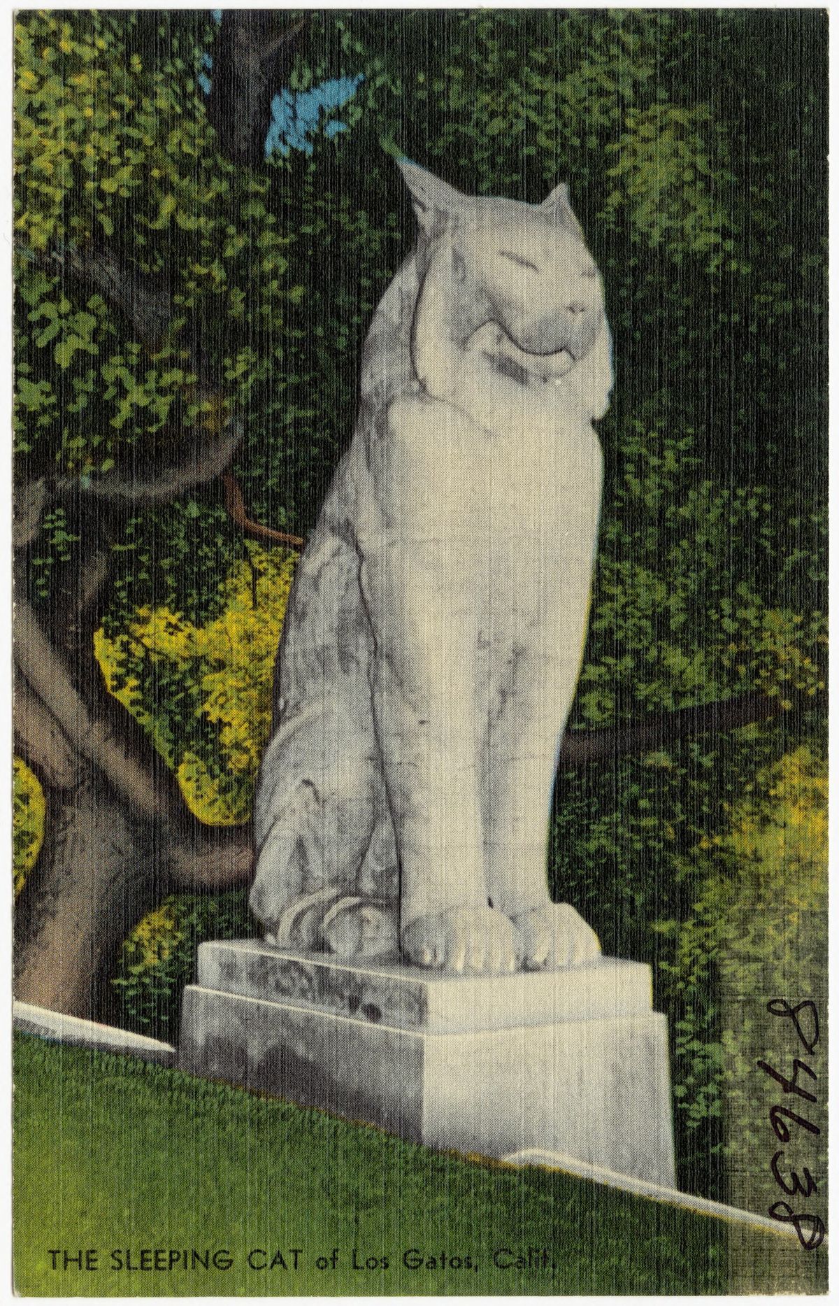 An old postcard of one of the Cats estate statues
