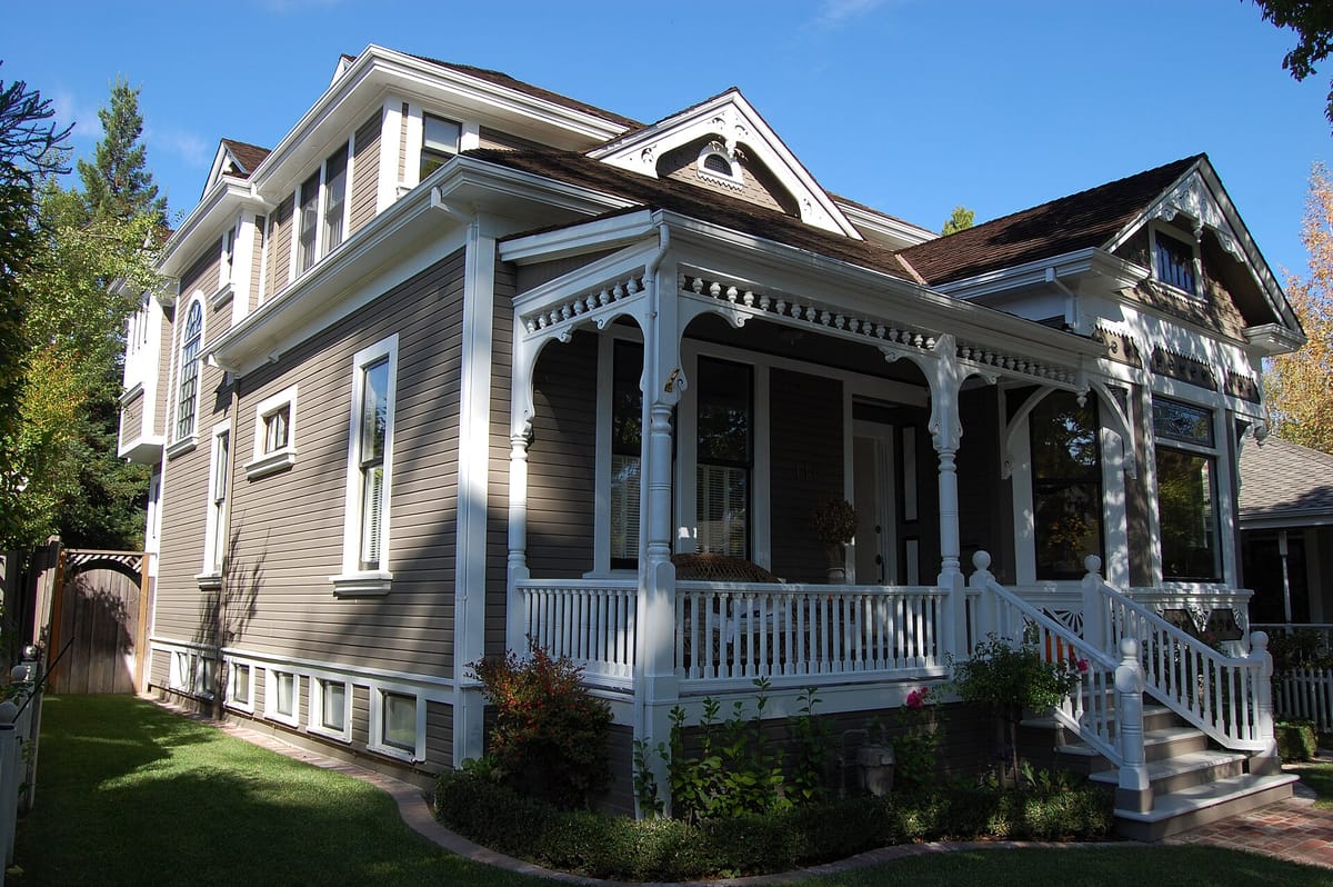 A Victorian house with a wide porch on Tait Avenue in Almond Grove