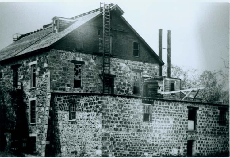 Forbes Mill around 1900, when the four-story stone mill still stood